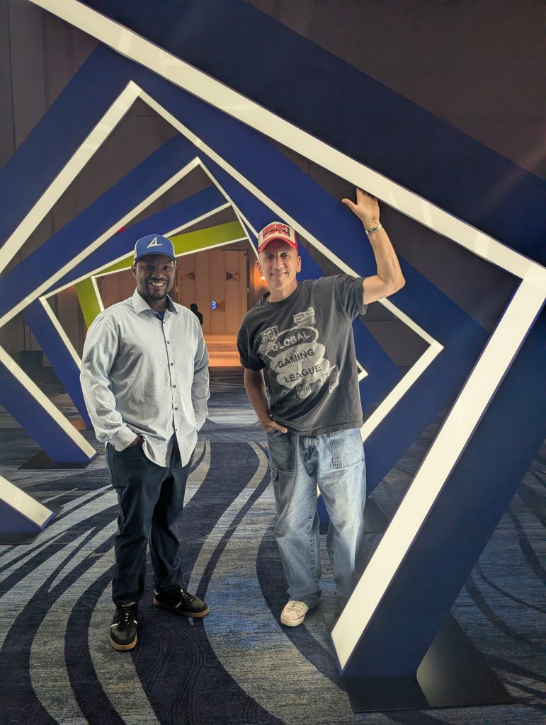 Jon-Claude and Clinton Sparks at iicon entrance
