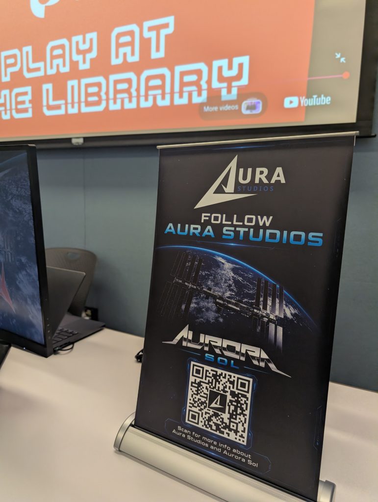 Aurora Sol retractable banner at Play at the Library event