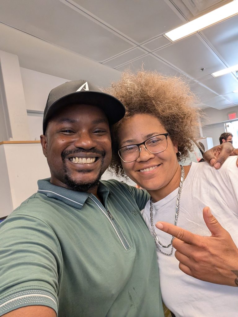 Aura Studios founder Jon-Claude with a college friend